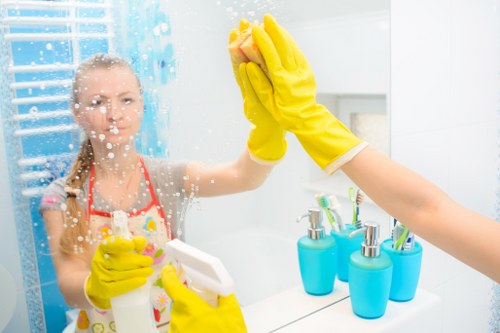 Detailed post-construction cleaning of kitchen surfaces in Highbury